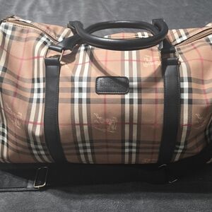Tan And Black Duffle Bag